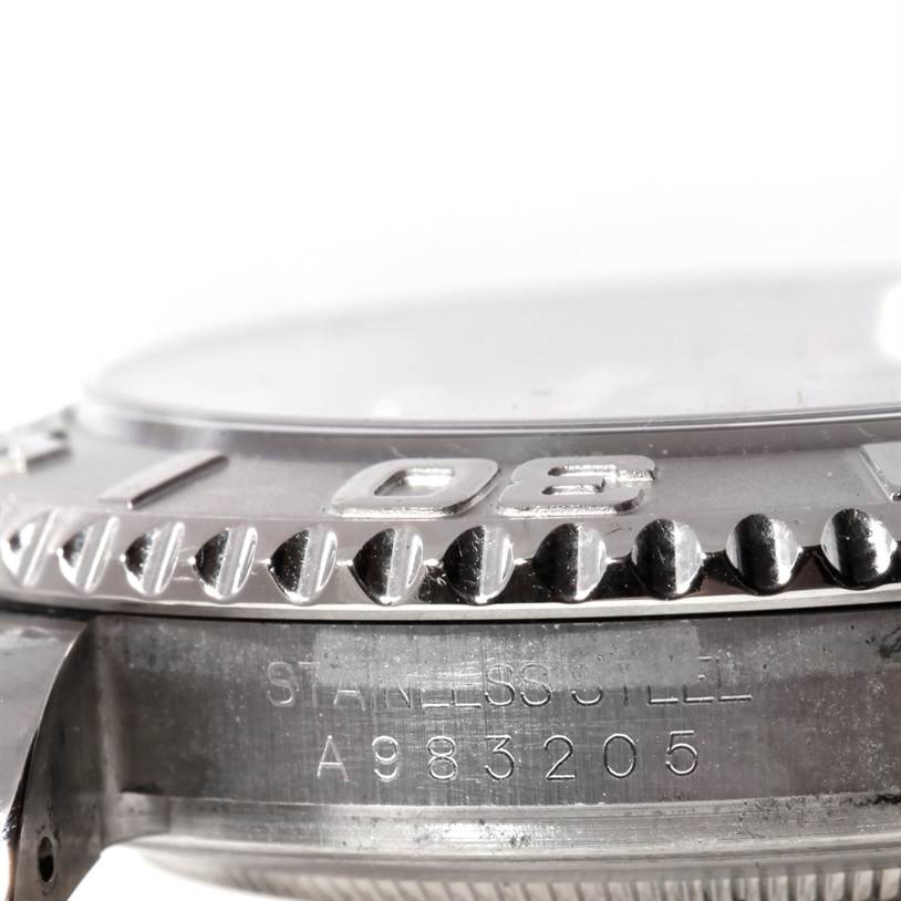 The image shows a close-up side view of the bezel, crown, and serial number of the Rolex Yacht-Master 16622 Men's Stainless Steel Silver Dial 16622 Men's Stainless Steel Silver Dial watch.