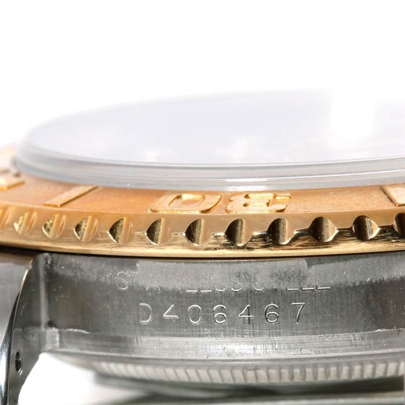 Close-up view of the bezel and case side of a Rolex Yacht-Master 16623 Men's Stainless Steel Grey Dial 16623 Men's Stainless Steel Grey Dial watch, showing details of the serial number.