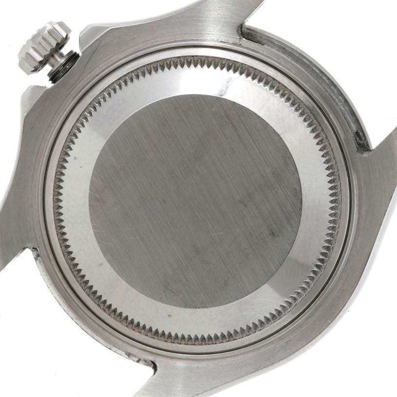 This image shows the back casing and crown of a Rolex Yacht-Master 168622 Stainless Steel Silver Dial 168622 Stainless Steel Silver Dial watch in a close-up angle.