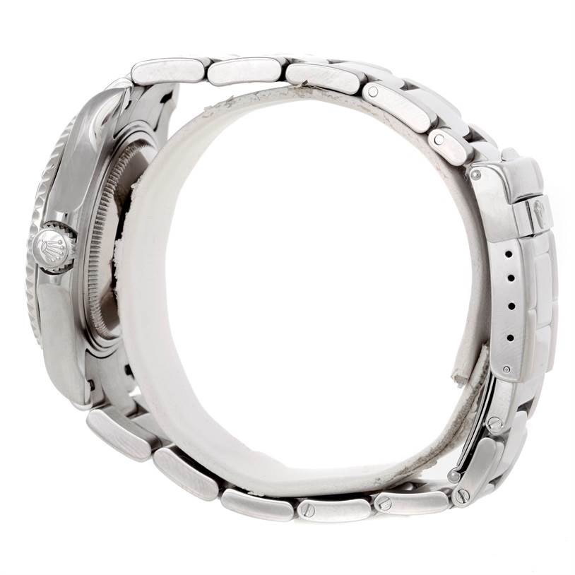 The image shows a side view of a Rolex Yacht-Master 168622 Stainless Steel Silver Dial 168622 Stainless Steel Silver Dial watch, highlighting the case, crown, and bracelet.