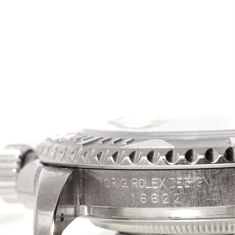 Close-up side view of the bezel and crown of the Rolex Yacht-Master 16622 Men's Stainless Steel Silver Dial 16622 Men's Stainless Steel Silver Dial model 16622, with the engraving visible.