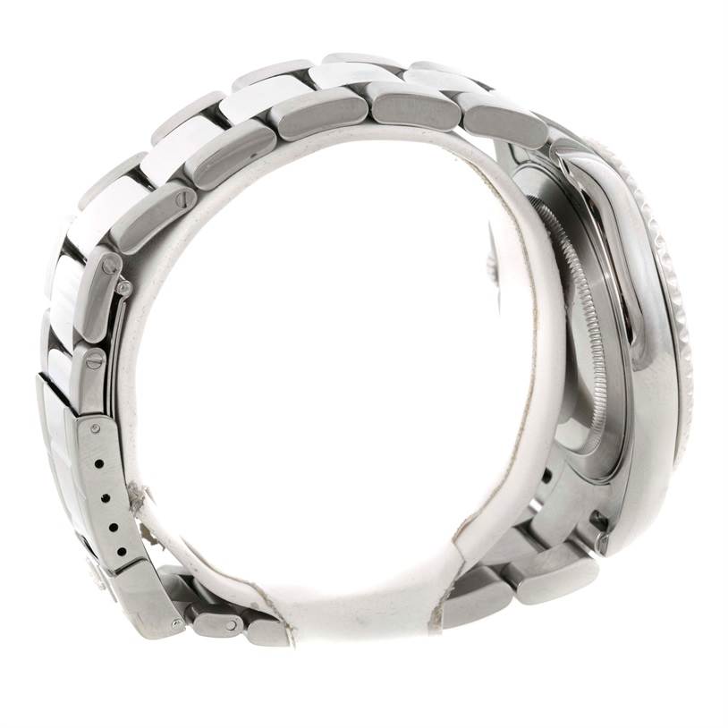 The side view of a Rolex Yacht-Master 16622 Men's Stainless Steel Silver Dial 16622 Men's Stainless Steel Silver Dial watch shows the bracelet and part of the bezel.