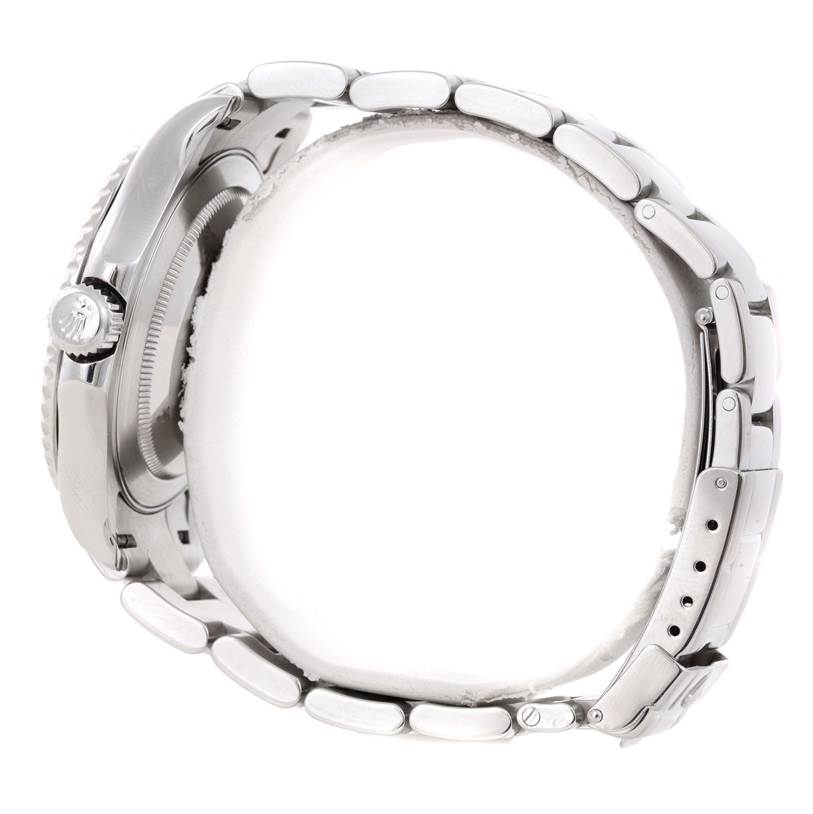 This side-angle view of the Rolex Yacht-Master 16622 Men's Stainless Steel Silver Dial 16622 Men's Stainless Steel Silver Dial watch features the case, crown, and bracelet.