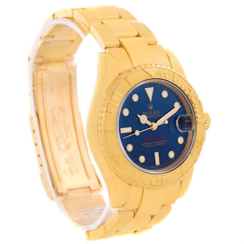 The Rolex Yacht-Master 68628 Men
s Yellow Gold Blue Dial 68628 Men
s Yellow Gold Blue Dial watch is shown at a front angle, highlighting its blue dial, gold bezel, and bracelet.