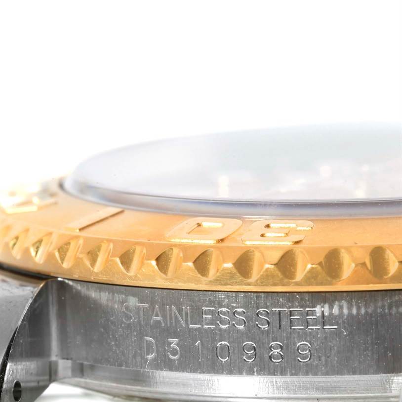 The image shows a close-up side view of the bezel and case of a Rolex Yacht-Master 16623 Men's Stainless Steel Champagne Dial 16623 Men's Stainless Steel Champagne Dial watch, highlighting the stainless steel and model number.