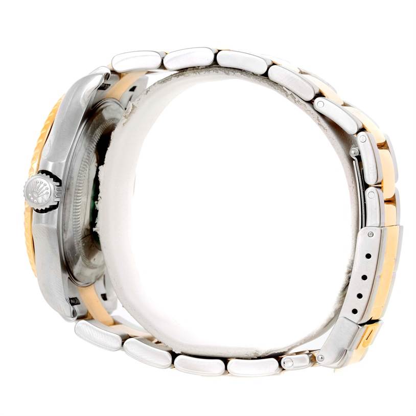 The image shows a side view of the Rolex Yacht-Master 16623 Men's Stainless Steel Champagne Dial 16623 Men's Stainless Steel Champagne Dial watch, featuring the crown and metal bracelet.