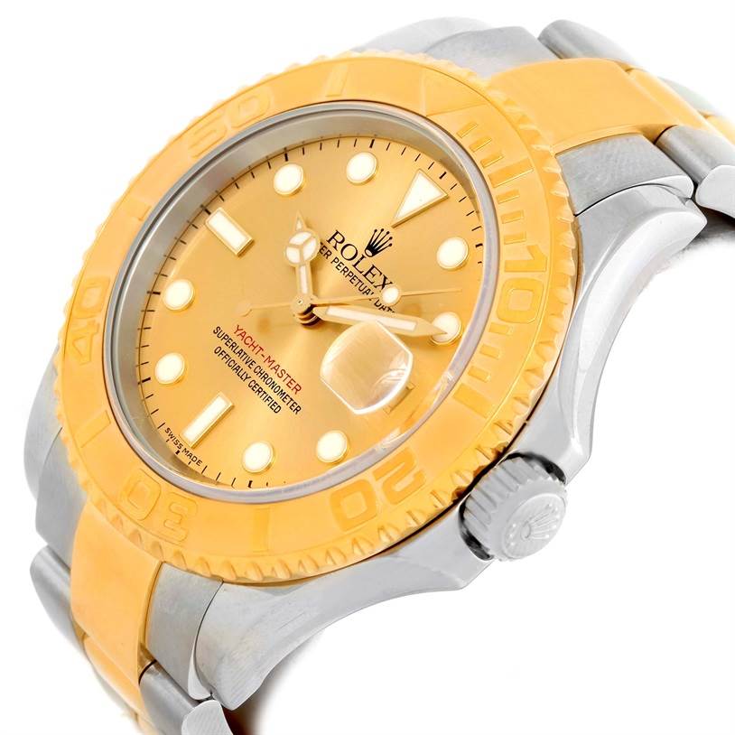 This Rolex Yacht-Master 16623 Men's Stainless Steel Champagne Dial 16623 Men's Stainless Steel Champagne Dial watch is shown at an angled view highlighting the bezel, dial, hands, crown, and part of the bracelet.