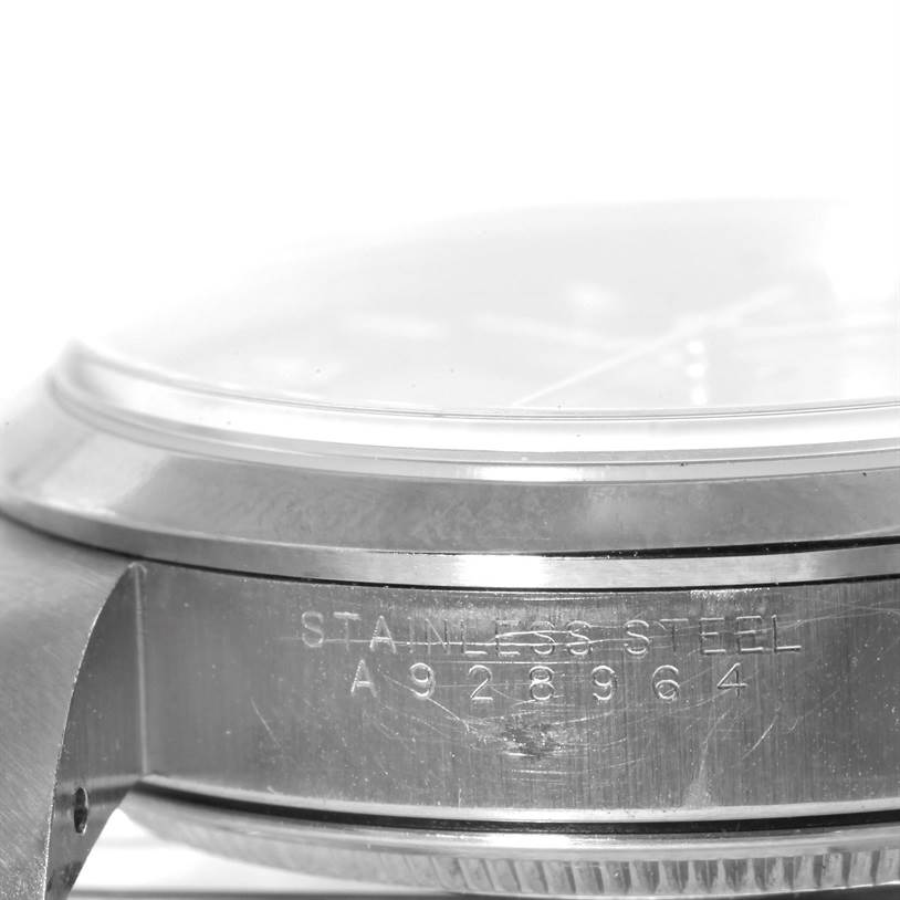 This shows the side of the Rolex Air-King 14000 Men's Stainless Steel Blue Dial 14000 Men's Stainless Steel Blue Dial watch case, highlighting the stainless steel material and serial number.