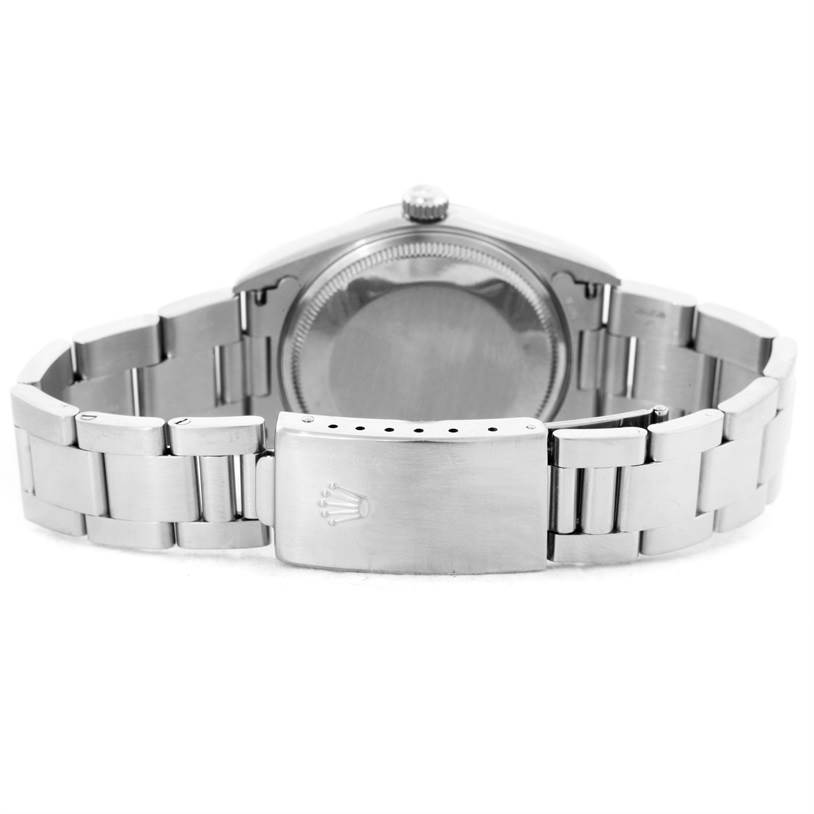 The image shows the back view of a Rolex Air-King 14000 Men's Stainless Steel Blue Dial 14000 Men's Stainless Steel Blue Dial watch, highlighting its case back and bracelet with the clasp.