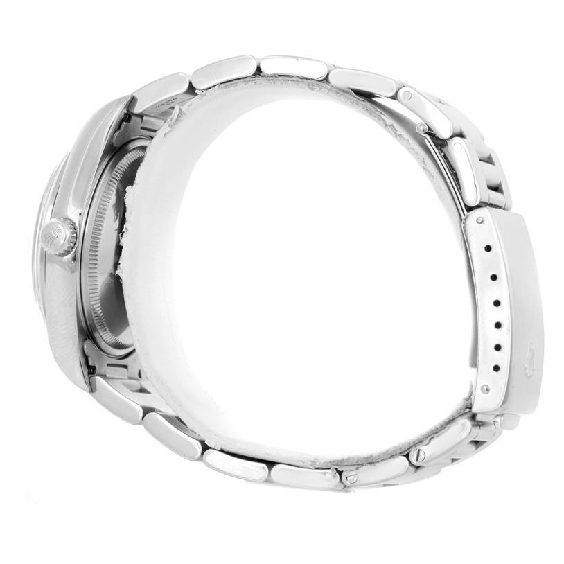 This is a side view showing the crown, case, and bracelet of the Rolex Air-King 14000 Men's Stainless Steel Blue Dial 14000 Men's Stainless Steel Blue Dial watch.