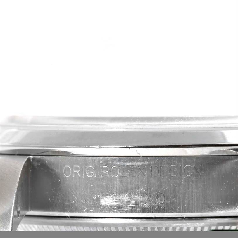 The image shows a close-up side view of the case of a Rolex Air-King 14000 Men's Stainless Steel Pink Dial 14000 Men's Stainless Steel Pink Dial watch, focusing on the "ORIG. ROLEX DESIGN" engraving.