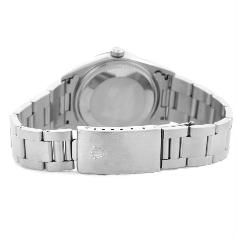 The image shows the back view of the Rolex Air-King 14000 Men's Stainless Steel Blue Dial 14000 Men's Stainless Steel Blue Dial watch, featuring its case, caseback, and metal bracelet with the clasp.