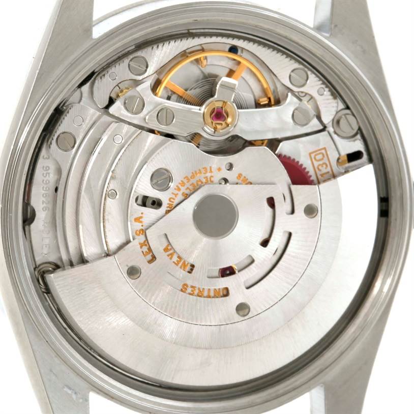 The image shows the movement of a Rolex Air-King 14000 Men's Stainless Steel Black Dial 14000 Men's Stainless Steel Black Dial watch from a rear angle, displaying its internal mechanical parts.