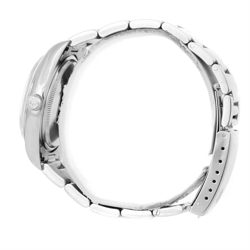 This is a side view of a Rolex Air-King 14000 Men's Stainless Steel Black Dial 14000 Men's Stainless Steel Black Dial watch, showing the case, crown, and bracelet fully extended.