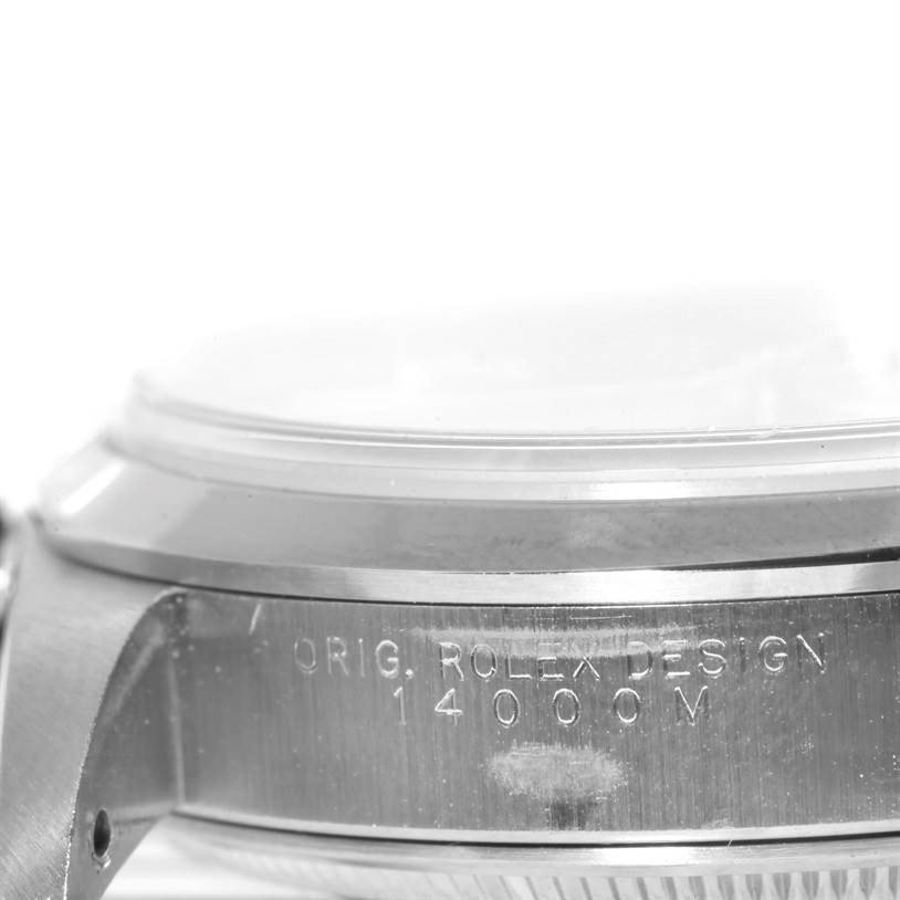 This side angle shows the engraved case side and bezel of a Rolex Air-King 14000 Men's Stainless Steel Black Dial 14000 Men's Stainless Steel Black Dial watch.