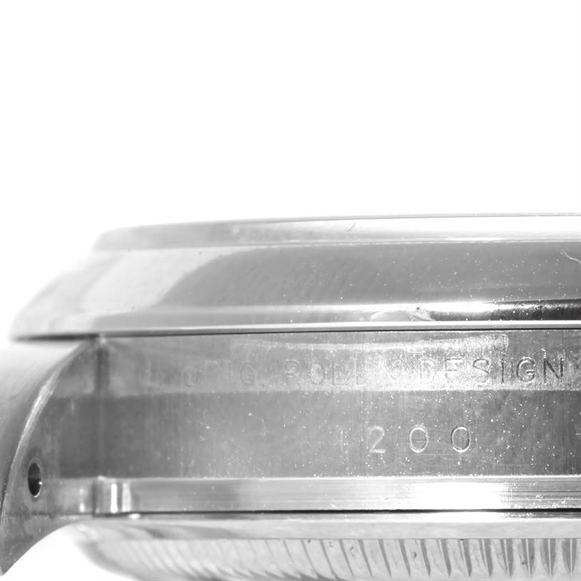 The image shows a close-up side view of the case and bezel of a Rolex Air-King 114200 Men's Stainless Steel Blue Dial 114200 Men's Stainless Steel Blue Dial watch.