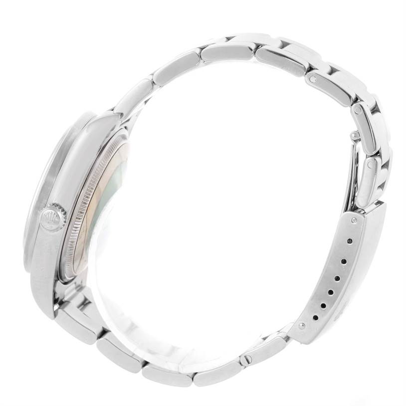 This image shows a side view of the Rolex Air-King 14010 Men's Stainless Steel Blue Dial 14010 Men's Stainless Steel Blue Dial watch focusing on the case, crown, and bracelet.