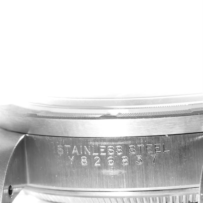 The image shows a close-up side view of a Rolex Air-King 14010 Men's Stainless Steel Blue Dial 14010 Men's Stainless Steel Blue Dial watch case, highlighting the stainless steel material and serial number.