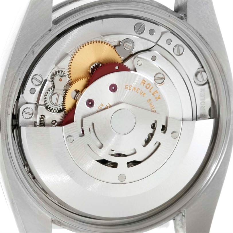 The image shows a close-up view of the movement mechanism of a Rolex Air-King 114210 Men's Stainless Steel Silver Dial 114210 Men's Stainless Steel Silver Dial watch.