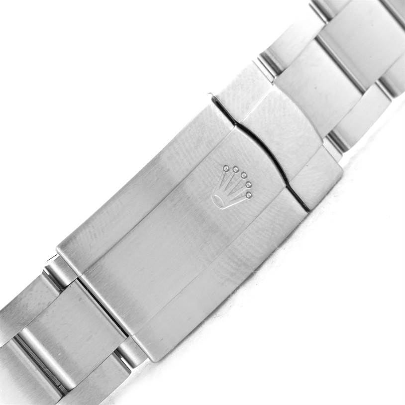 This image shows the clasp and bracelet of a Rolex Air-King 114210 Men's Stainless Steel Silver Dial 114210 Men's Stainless Steel Silver Dial watch, viewed from the top.