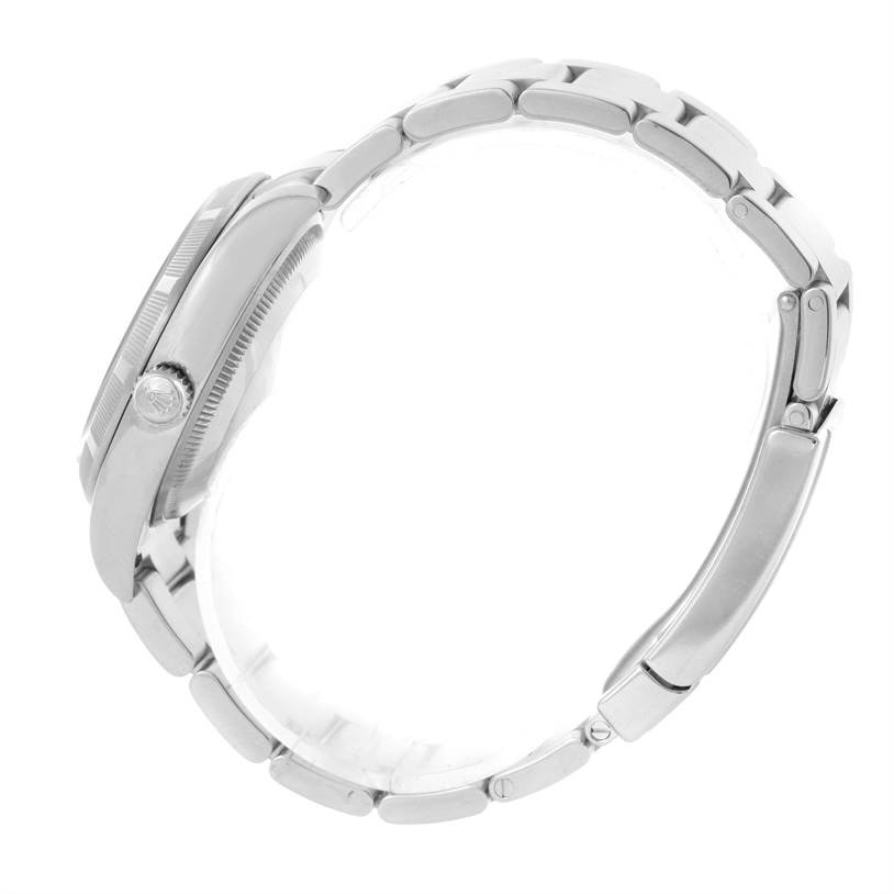 The image shows a side profile of a Rolex Air-King 114210 Men's Stainless Steel Silver Dial 114210 Men's Stainless Steel Silver Dial watch, highlighting its crown, case, and bracelet.