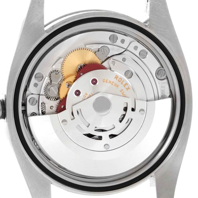 This image shows the back view of the inner mechanical components of a Rolex Air-King 114200 Men's Stainless Steel Silver Dial 114200 Men's Stainless Steel Silver Dial watch.