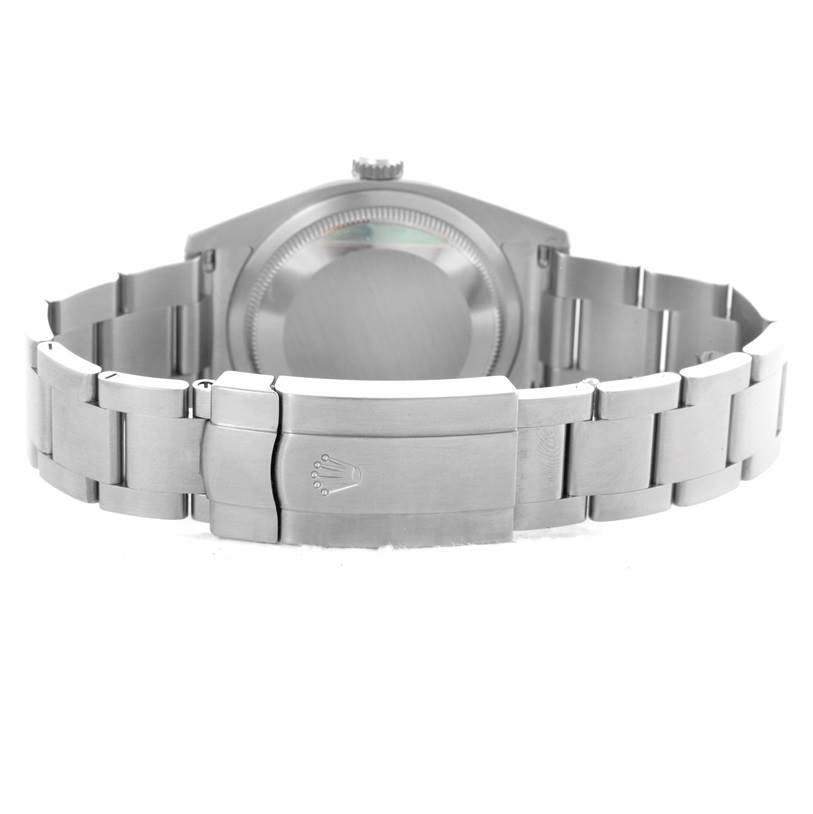 The image shows the clasp, bracelet, case back, and crown of a Rolex Air-King 114200 Men's Stainless Steel Silver Dial 114200 Men's Stainless Steel Silver Dial watch, viewed from the back.