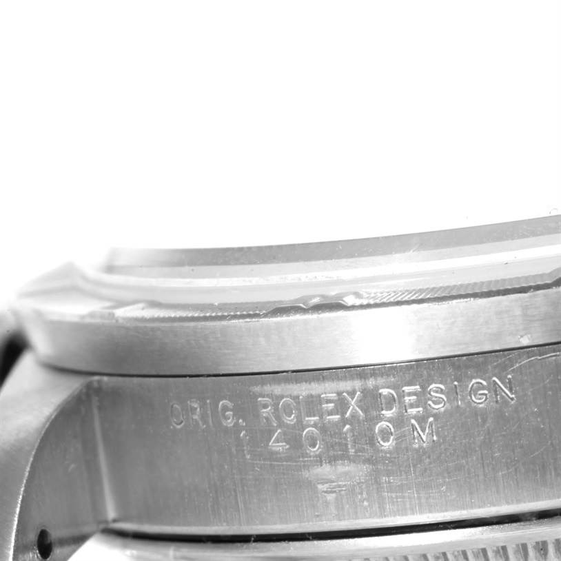 The image shows a close-up side view of the case and bezel of a Rolex Air-King 14010 Men's Stainless Steel Silver Dial 14010 Men's Stainless Steel Silver Dial watch, highlighting engravings on the case side.