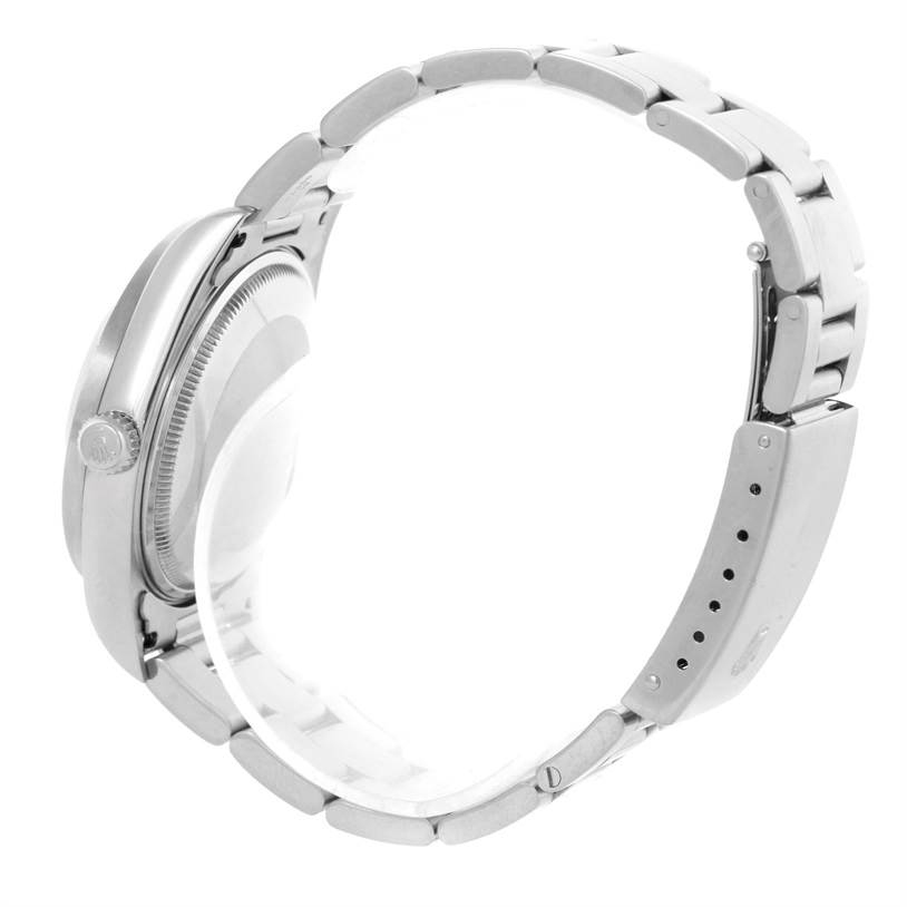 The Rolex Air-King 14010 Men's Stainless Steel Silver Dial 14010 Men's Stainless Steel Silver Dial watch is shown from a side angle, highlighting its bracelet, case, crown, and clasp.