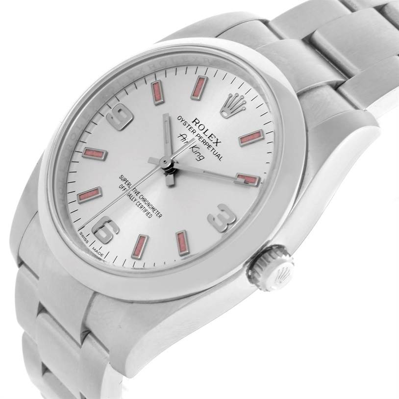 The Rolex Air-King 114200 Men's Stainless Steel Silver Dial 114200 Men's Stainless Steel Silver Dial watch is viewed at a slight angle, showing its face, crown, and part of the bracelet.