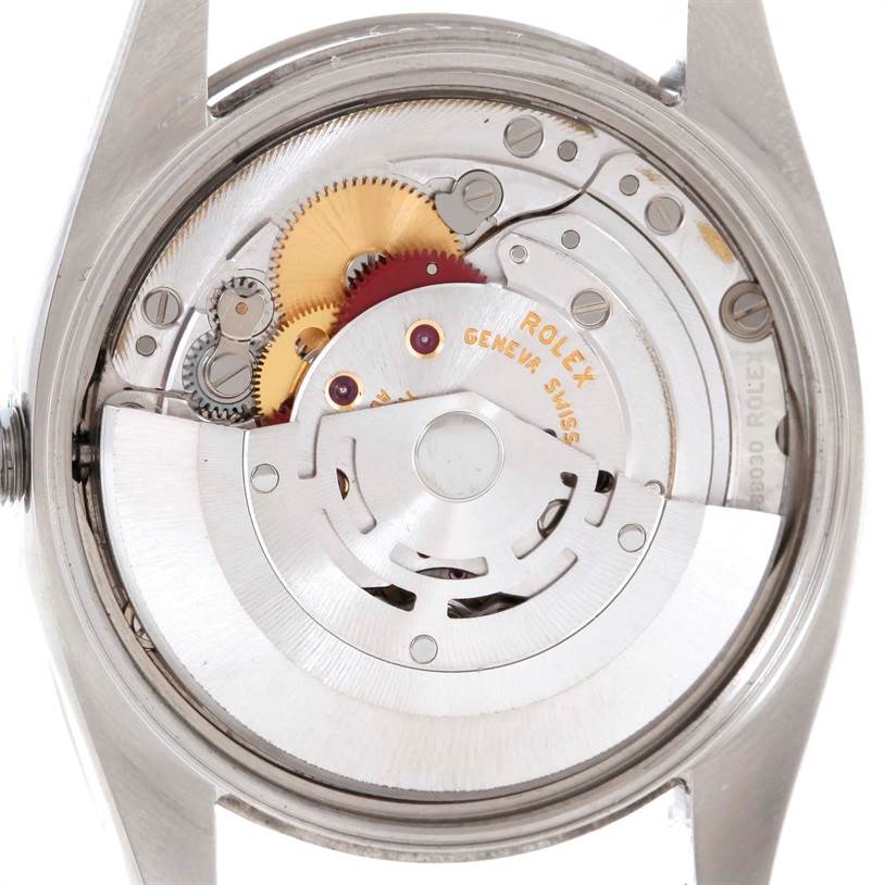 This image shows the internal mechanism of a Rolex Air-King 114200 Men's Stainless Steel Silver Dial 114200 Men's Stainless Steel Silver Dial watch from a rear angle.
