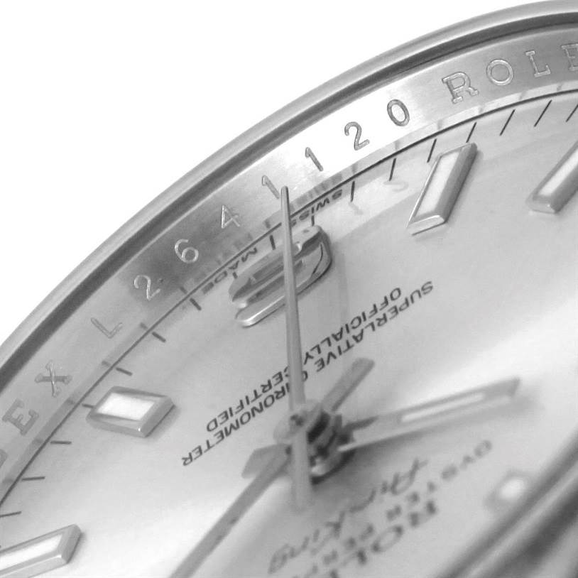 The image shows a close-up angle of the dial, hands, and part of the bezel of the Rolex Air-King 114200 Men's Stainless Steel Silver Dial 114200 Men's Stainless Steel Silver Dial watch.