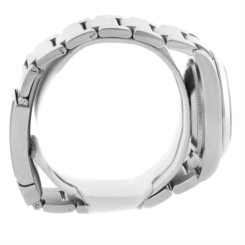 This side view of the Rolex Air-King 114200 Men's Stainless Steel Silver Dial 114200 Men's Stainless Steel Silver Dial watch shows the bracelet and case in stainless steel.