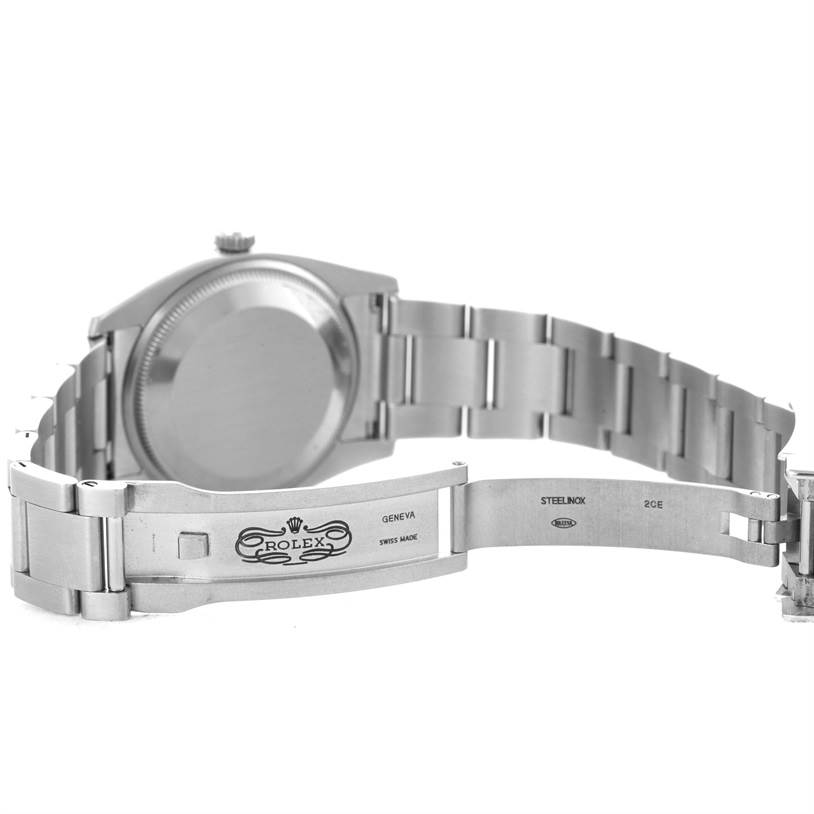 The image shows the backside and opened clasp of a Rolex Air-King 114200 Men's Stainless Steel Silver Dial 114200 Men's Stainless Steel Silver Dial watch, highlighting its bracelet and clasp details.