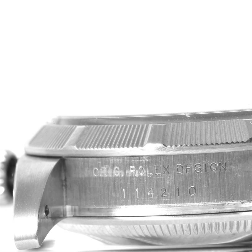 This image shows a side view of the case and crown of a Rolex Air-King 114210 Men's Stainless Steel Blue Dial 114210 Men's Stainless Steel Blue Dial watch, highlighting the engraved details.