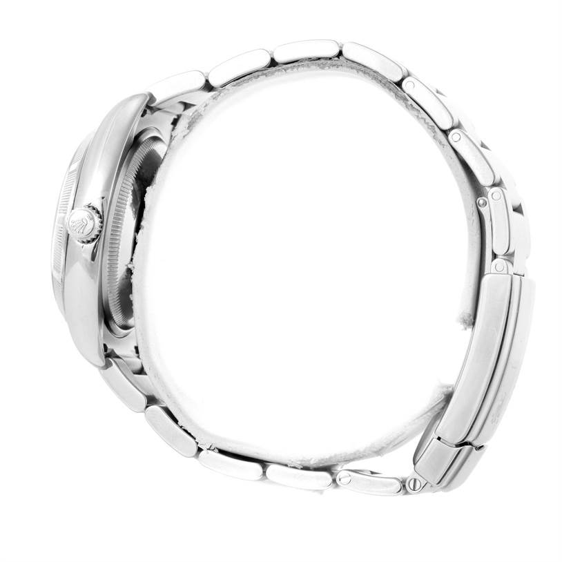 The image shows a side profile of a Rolex Air-King 114210 Men's Stainless Steel Blue Dial 114210 Men's Stainless Steel Blue Dial watch, highlighting the casing, crown, and metal bracelet.