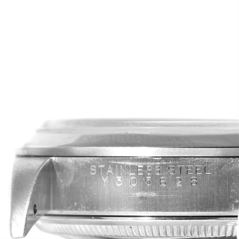 The image shows a side profile of the Rolex Air-King 14000 Men's Stainless Steel Blue Dial 14000 Men's Stainless Steel Blue Dial watch's casing, emphasizing the stainless steel material and serial number.