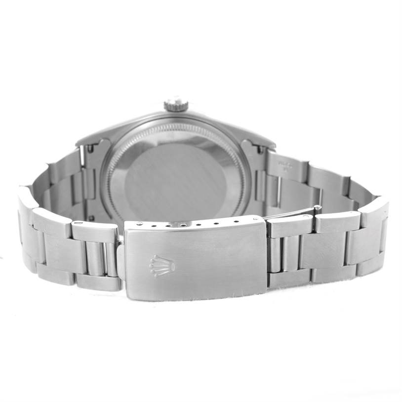 This image shows the back case and metal bracelet clasp of a Rolex Air-King 14000 Men's Stainless Steel Blue Dial 14000 Men's Stainless Steel Blue Dial watch.