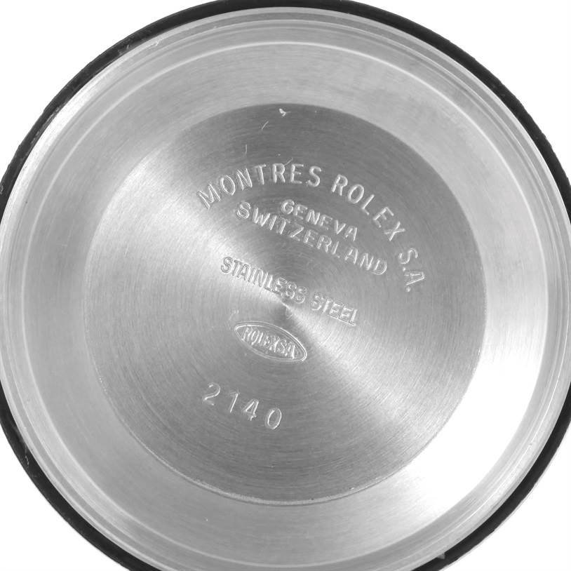 The image shows the interior case back of a Rolex Air-King 14010 Men's Stainless Steel Silver Dial 14010 Men's Stainless Steel Silver Dial watch with engravings indicating the brand, material, and origin.