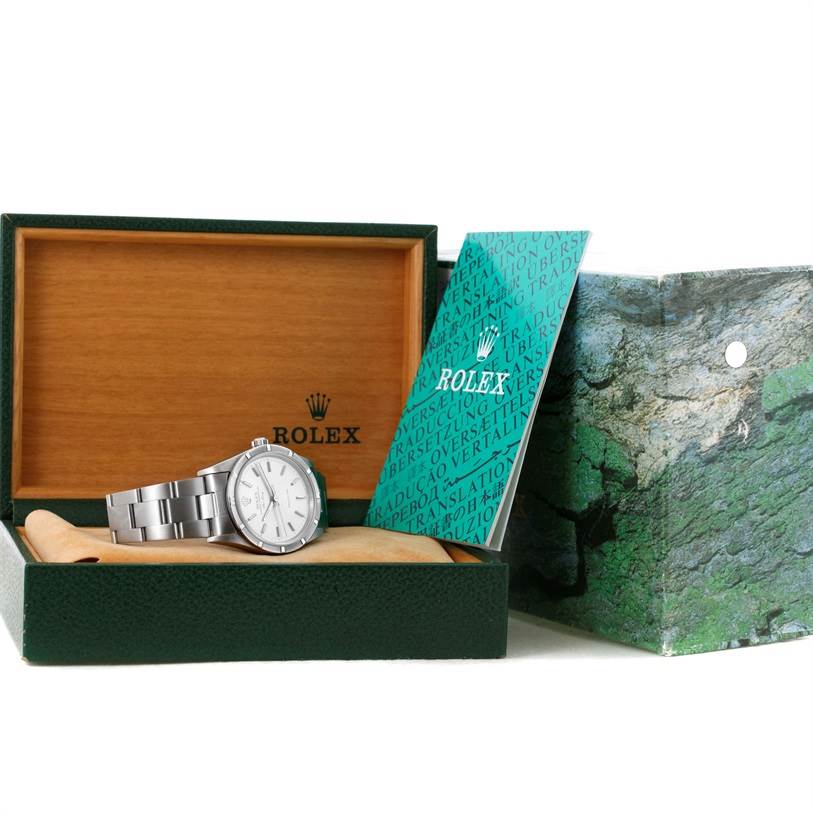 The image shows a Rolex Air-King 14010 Men's Stainless Steel Silver Dial 14010 Men's Stainless Steel Silver Dial watch in its box along with its instruction manual and outer packaging.