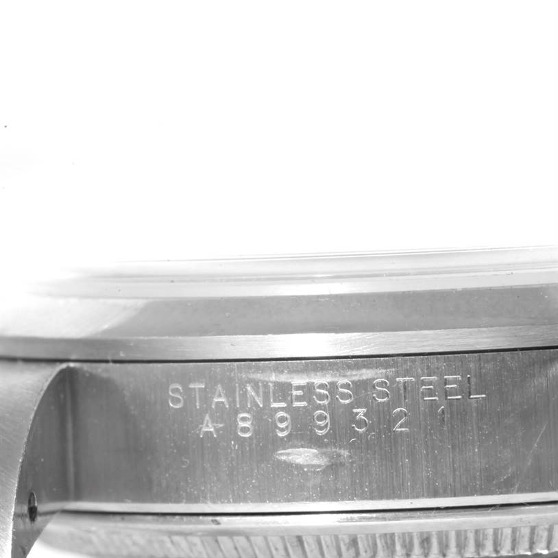 This image shows a close-up of the side of the Rolex Air-King 14000 Men's Stainless Steel Blue Dial 14000 Men's Stainless Steel Blue Dial watch case with the model number and "STAINLESS STEEL" inscription visible.