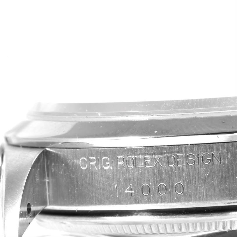 This image shows a close-up side angle of the Rolex Air-King 14000 Men's Stainless Steel Blue Dial 14000 Men's Stainless Steel Blue Dial watch, highlighting its engraved case with "ORIG. ROLEX DESIGN 14000".