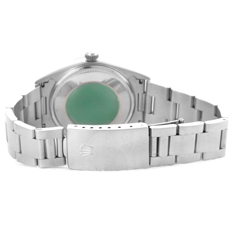 The image shows the back case and the bracelet clasp of a Rolex Air-King 14000 Men's Stainless Steel Blue Dial 14000 Men's Stainless Steel Blue Dial watch.