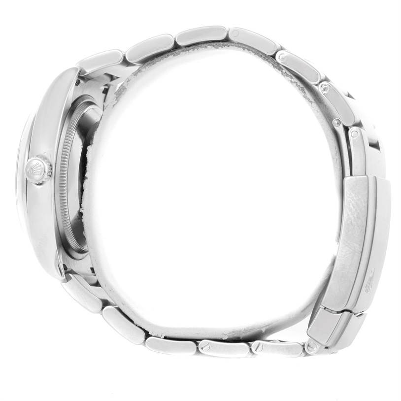 The Rolex Air-King 114200 Men's Stainless Steel Silver Dial 114200 Men's Stainless Steel Silver Dial watch is shown from a side angle, highlighting the case, bracelet, and clasp.