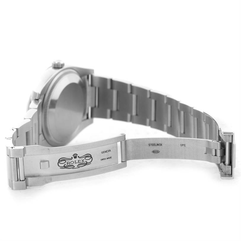 This image shows an open clasp and the back side of the bracelet of a Rolex Air-King 114200 Men's Stainless Steel Silver Dial 114200 Men's Stainless Steel Silver Dial watch.
