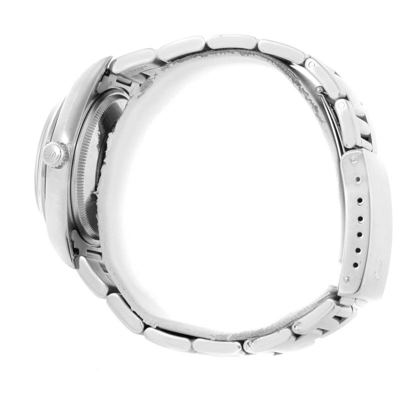 This image shows a side view of the Rolex Air-King 14000 Men's Stainless Steel Black Dial 14000 Men's Stainless Steel Black Dial, highlighting its crown, case, and metal bracelet with a clasp.