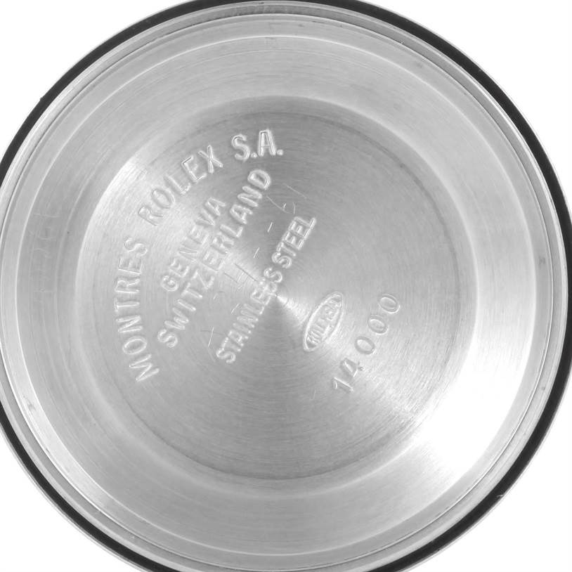 This image shows the inside of the case back of a Rolex Air-King 14010 Men's Stainless Steel Blue Dial 14010 Men's Stainless Steel Blue Dial watch, engraved with brand and model information.