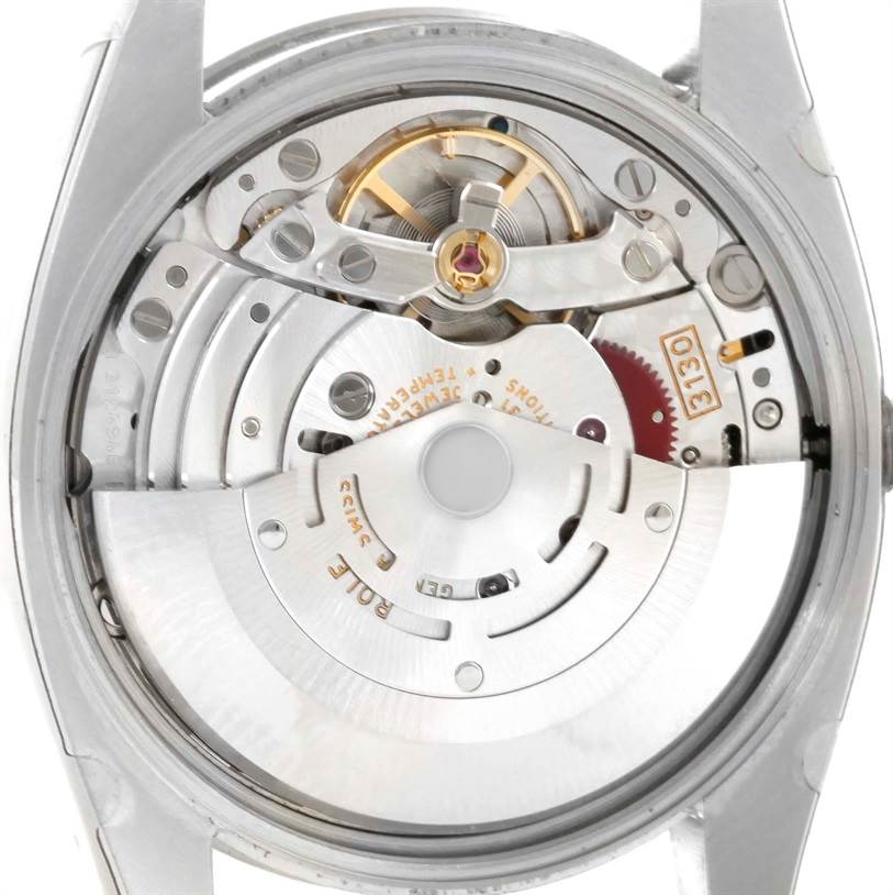 The image shows the movement and internal mechanics of a Rolex Air-King 114200 Men's Stainless Steel Blue Dial 114200 Men's Stainless Steel Blue Dial watch from the back.