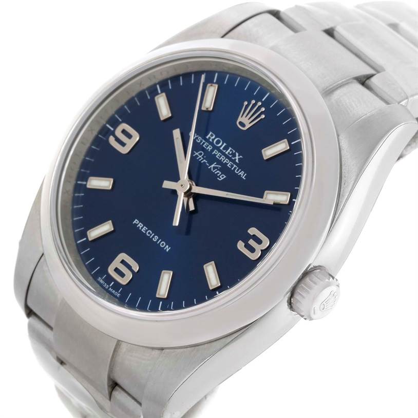 This is a Rolex Air-King 114200 Men's Stainless Steel Blue Dial 114200 Men's Stainless Steel Blue Dial watch shown from a top-side angle, displaying its blue dial, bezel, crown, and part of the bracelet.