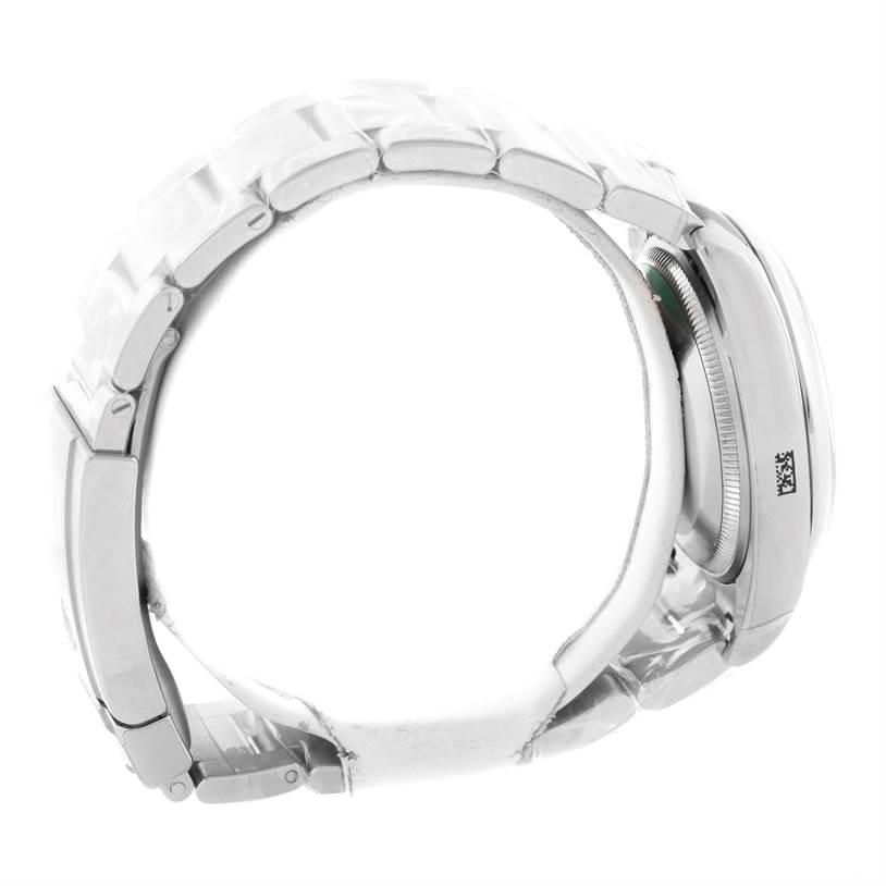 The image shows a side view of the Rolex Air-King 114200 Men's Stainless Steel Blue Dial 114200 Men's Stainless Steel Blue Dial watch, highlighting its bracelet and case.